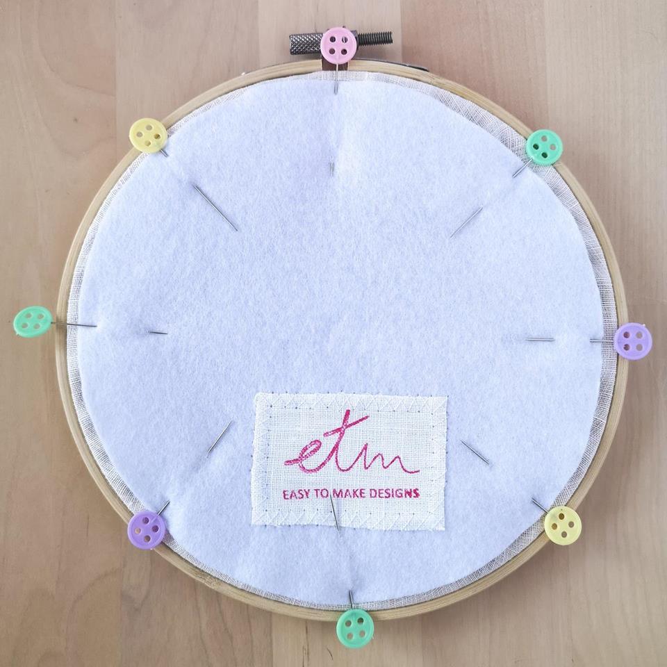 Framing the embroidery in a hoop 6 Backing the hoop with felt